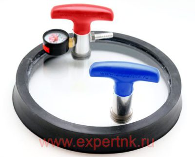 Round flat vacuum box with arrow vacuum indicator gauge and valve handles